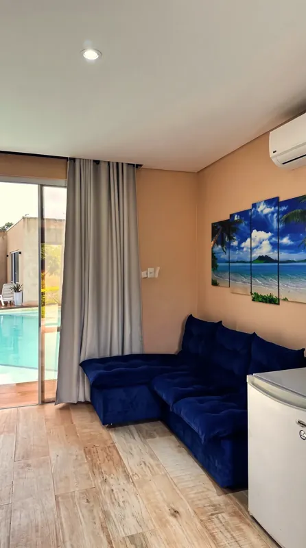 Habitación Aqua · Sofá y frigobar